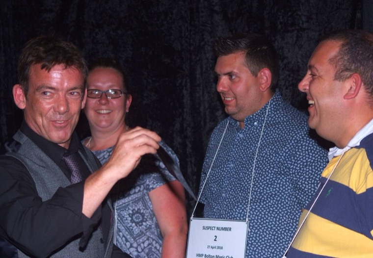 John on stage at a corporate event